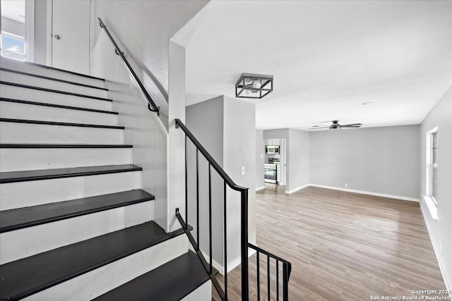 910 Mount Kisco, San Antonio, TX 78213 - staircase with wood finished floors and a ceiling fan