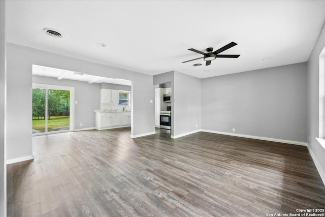 910 Mount Kisco, San Antonio, TX 78213 - unfurnished living room with ceiling fan and dark wood finished floors