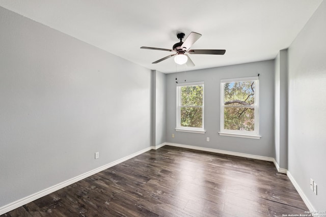 4130 Luckenbach, San Antonio, TX 78251 - spare room with dark wood-style floors and a ceiling fan