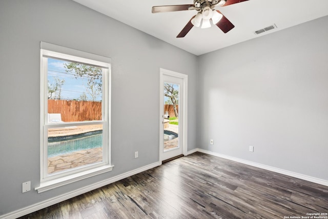 4130 Luckenbach, San Antonio, TX 78251 - spare room with healthy amount of natural light, wood finished floors, and a ceiling fan
