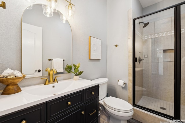 4130 Luckenbach, San Antonio, TX 78251 - full bath with vanity, a shower stall, and a textured wall
