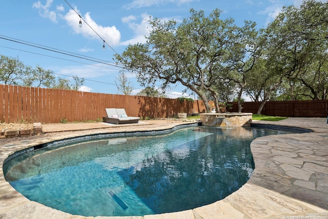 4130 Luckenbach, San Antonio, TX 78251 - view of pool with a fenced backyard and a pool with connected hot tub