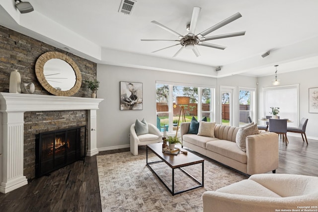 4130 Luckenbach, San Antonio, TX 78251 - living room with ceiling fan, wood finished floors, and a fireplace