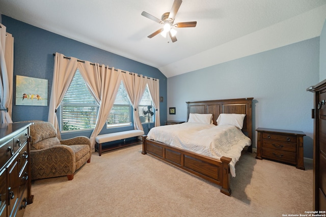 1573 Las Fontanasa, New Braunfels, TX 78132 - bedroom with light carpet, vaulted ceiling, and a ceiling fan