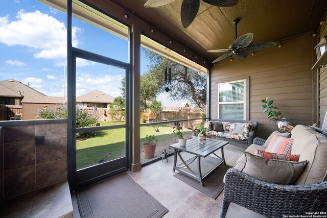 1573 Las Fontanasa, New Braunfels, TX 78132 - sunroom / solarium featuring a ceiling fan, an outdoor hangout area, and track lighting