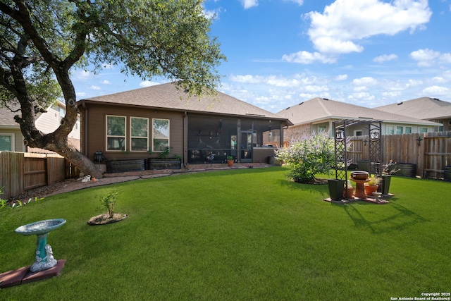 1573 Las Fontanasa, New Braunfels, TX 78132 - rear view of property featuring a fenced backyard, a sunroom, and roof with shingles