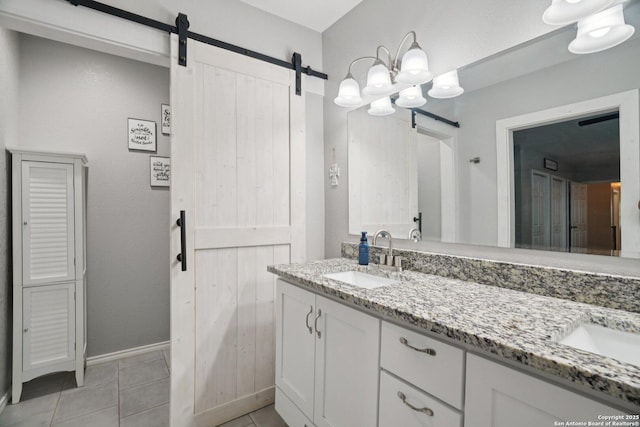 714 N Esplanade, Karnes City, TX 78118 - bathroom featuring double vanity and tile patterned floors