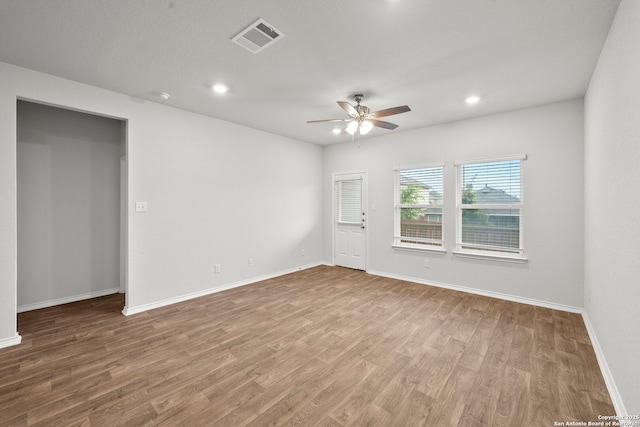 14034 Breccia, San Antonio, TX 78253 - unfurnished room with wood finished floors, a ceiling fan, and recessed lighting
