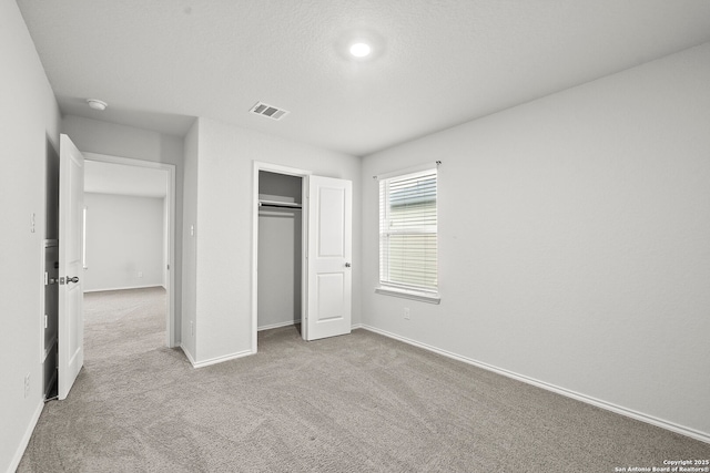 14034 Breccia, San Antonio, TX 78253 - unfurnished bedroom featuring carpet and a closet