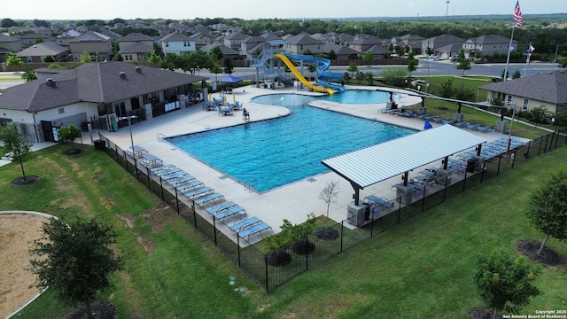 14034 Breccia, San Antonio, TX 78253 - community pool featuring a water slide, a residential view, and a patio area