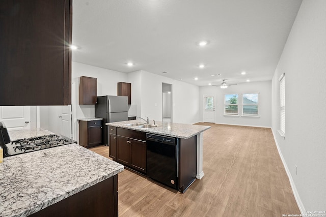 14034 Breccia, San Antonio, TX 78253 - kitchen with dishwasher, a ceiling fan, range, light wood finished floors, and dark brown cabinets
