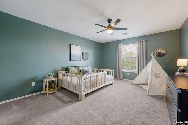 21731 Cliff Vw, San Antonio, TX 78259 - carpeted bedroom with a nursery area and ceiling fan