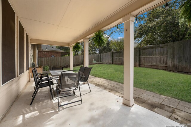 21731 Cliff Vw, San Antonio, TX 78259 - fenced backyard featuring outdoor dining area and a patio area