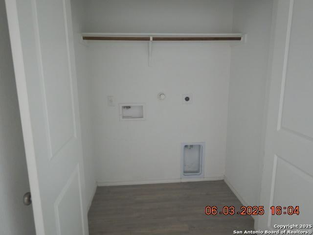 10751 Margarita Loop, Converse, TX 78109 - washroom with hookup for a gas dryer, wood finished floors, hookup for an electric dryer, and hookup for a washing machine