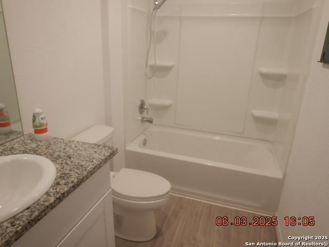 10751 Margarita Loop, Converse, TX 78109 - full bath with wood finished floors, vanity, and shower / tub combination