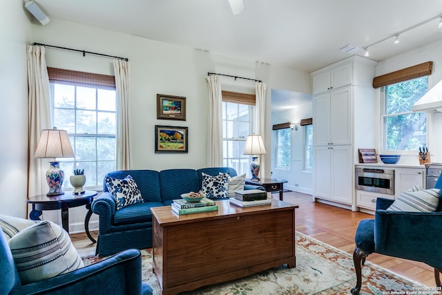 158 Laurel Hts, San Antonio, TX 78212 - living area with track lighting and healthy amount of natural light