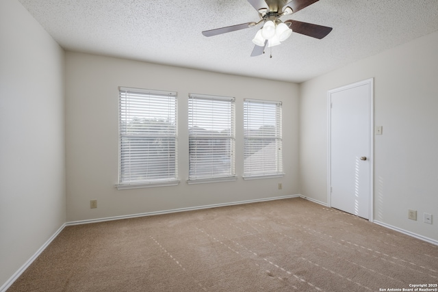10217 Sandbrook, San Antonio, TX 78254 - carpeted spare room with a textured ceiling and ceiling fan