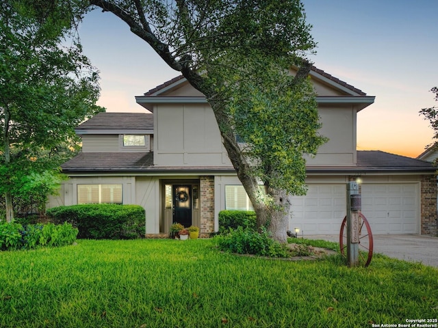 16018 Alsace, San Antonio, TX 78232 - view of front of property featuring a tile roof, a yard, and concrete driveway