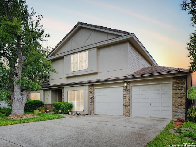16018 Alsace, San Antonio, TX 78232 - view of front of property with driveway, a garage, a tiled roof, and brick siding