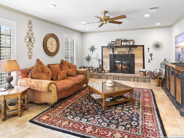 16018 Alsace, San Antonio, TX 78232 - living area featuring ornamental molding, ceiling fan, recessed lighting, stone finish flooring, and a fireplace