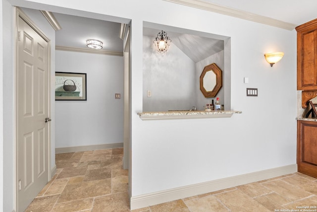 16018 Alsace, San Antonio, TX 78232 - bathroom with stone tile flooring, ornamental molding, and a chandelier