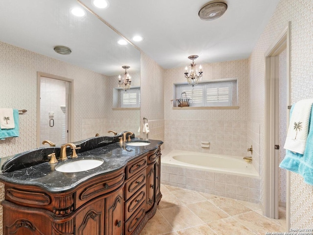 16018 Alsace, San Antonio, TX 78232 - full bath featuring a chandelier, a bath, double vanity, tile patterned flooring, and wallpapered walls