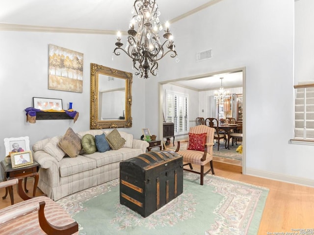 16018 Alsace, San Antonio, TX 78232 - living area featuring a chandelier, ornamental molding, and wood finished floors