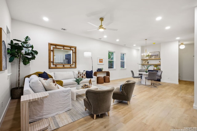 1939 W French Pl, San Antonio, TX 78201 - living room with recessed lighting, light wood finished floors, and a ceiling fan