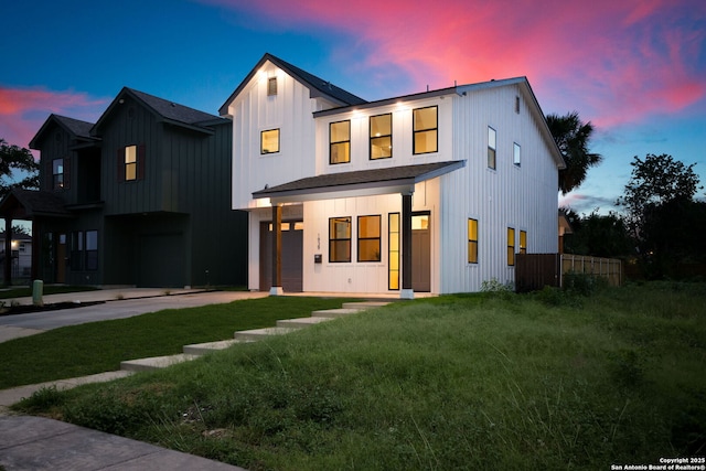 1939 W French Pl, San Antonio, TX 78201 - view of front of property featuring a front lawn and board and batten siding