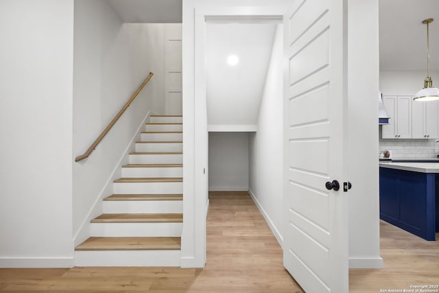 1939 W French Pl, San Antonio, TX 78201 - staircase featuring wood finished floors and baseboards