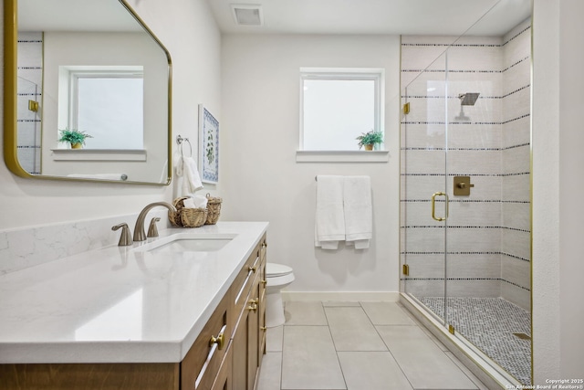 1939 W French Pl, San Antonio, TX 78201 - full bath with vanity, tile patterned flooring, and a stall shower