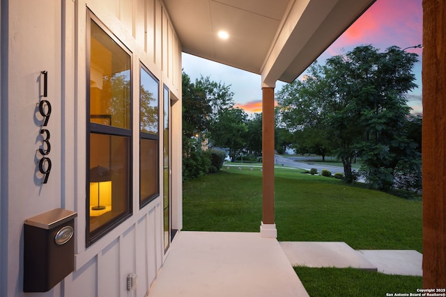 1939 W French Pl, San Antonio, TX 78201 - patio terrace at dusk with a lawn