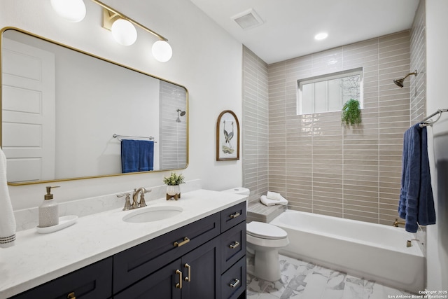 1939 W French Pl, San Antonio, TX 78201 - bathroom with vanity, tub / shower combination, and marble look tiles