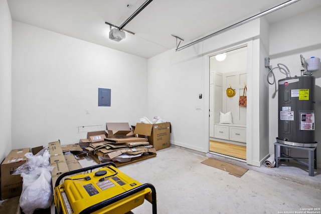 1939 W French Pl, San Antonio, TX 78201 - garage featuring water heater, electric panel, and a garage door opener