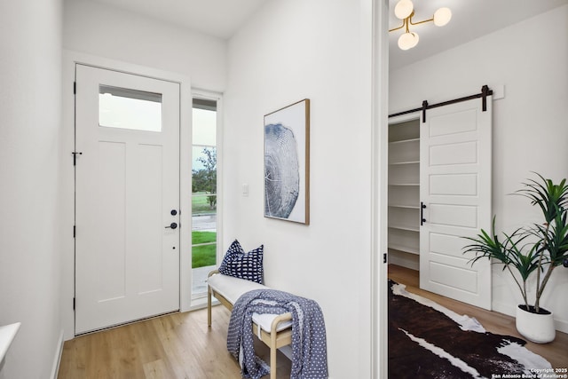 1939 W French Pl, San Antonio, TX 78201 - entryway featuring light wood-style flooring and a barn door