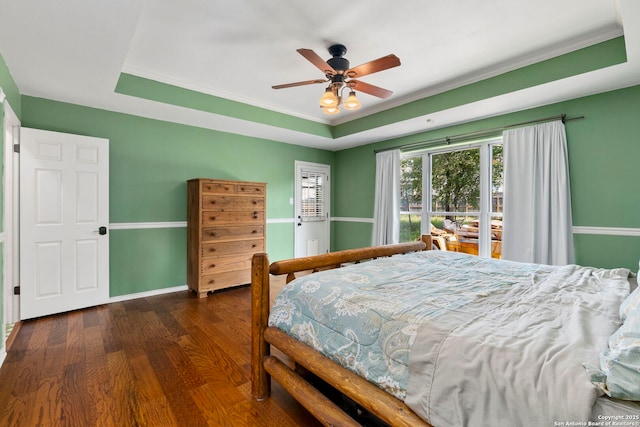 19502 Encino Bow, San Antonio, TX 78259 - bedroom featuring a tray ceiling, dark wood-type flooring, and ceiling fan