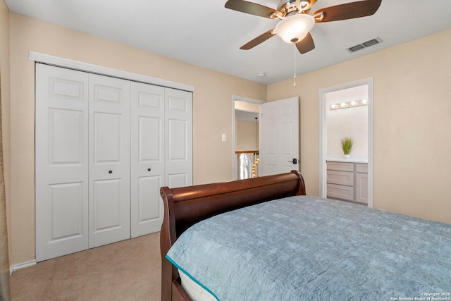 19502 Encino Bow, San Antonio, TX 78259 - bedroom with light carpet, a closet, a ceiling fan, and ensuite bathroom