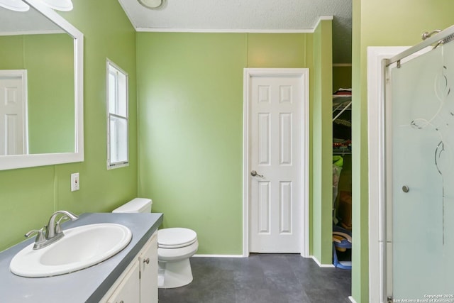 1111 Valeria, Marion, TX 78124 - bathroom with vanity, a stall shower, and a walk in closet