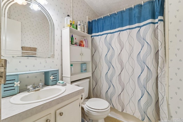 1111 Valeria, Marion, TX 78124 - bathroom with wallpapered walls, vanity, curtained shower, and a textured ceiling
