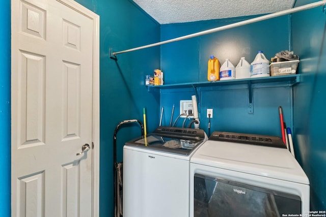 1111 Valeria, Marion, TX 78124 - washroom with washer and clothes dryer and a textured ceiling