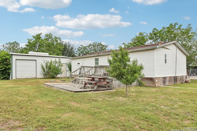 1111 Valeria, Marion, TX 78124 - rear view of house with a wooden deck, an outbuilding, and a lawn