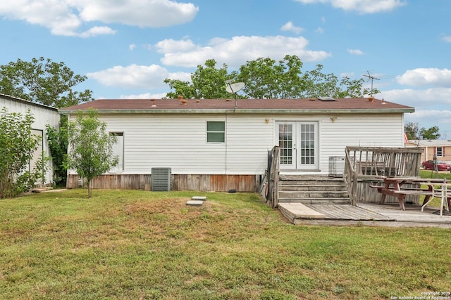 1111 Valeria, Marion, TX 78124 - rear view of property featuring french doors, a deck, and a lawn