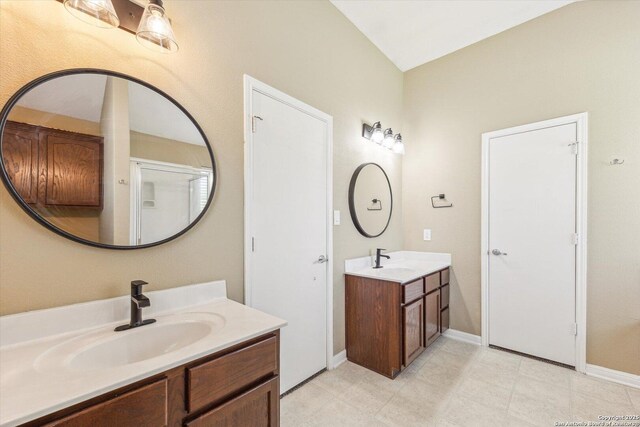 7738 Brisbane Bnd, Converse, TX 78109 - bathroom featuring two vanities and baseboards