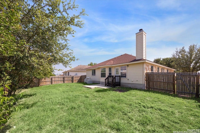 7738 Brisbane Bnd, Converse, TX 78109 - rear view of house featuring a fenced backyard, a chimney, and a patio