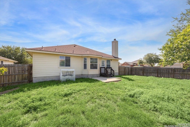 7738 Brisbane Bnd, Converse, TX 78109 - back of property featuring a fenced backyard and a chimney