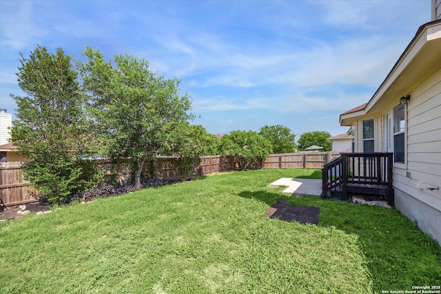 7738 Brisbane Bnd, Converse, TX 78109 - fenced backyard featuring a patio
