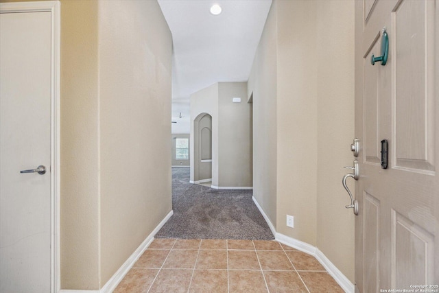 7738 Brisbane Bnd, Converse, TX 78109 - hall with light tile patterned flooring and light carpet