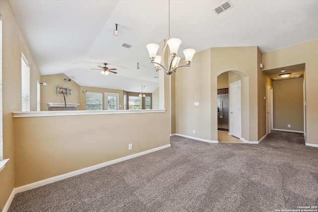 7738 Brisbane Bnd, Converse, TX 78109 - empty room featuring arched walkways, a ceiling fan, carpet flooring, vaulted ceiling, and a chandelier