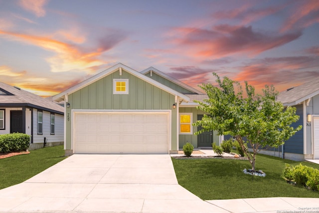 759 Crested Iris, New Braunfels, TX 78130 - view of front of property with board and batten siding, an attached garage, a front lawn, and concrete driveway