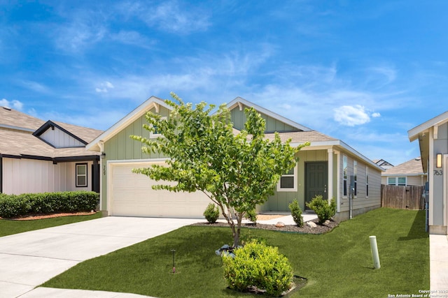 759 Crested Iris, New Braunfels, TX 78130 - view of front facade featuring a garage, concrete driveway, and board and batten siding